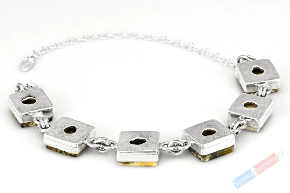Originální stříbrný náramek (Ag 925/1000) s baltským bílým jantarem s inkluzemi QAA, šest kamenů o velikosti cca 14 x 15 mm, "den a noc" (JA5158NS)